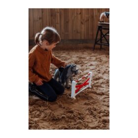 By Astrup - Toy pony spring m. krydsende bomme