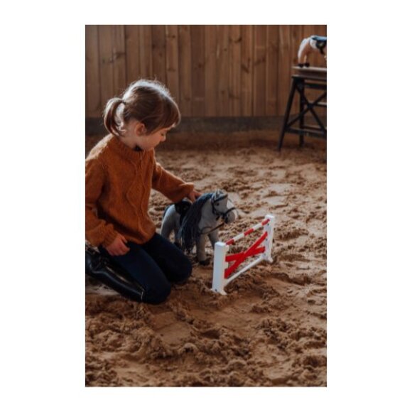 By Astrup - Toy pony spring m. krydsende bomme